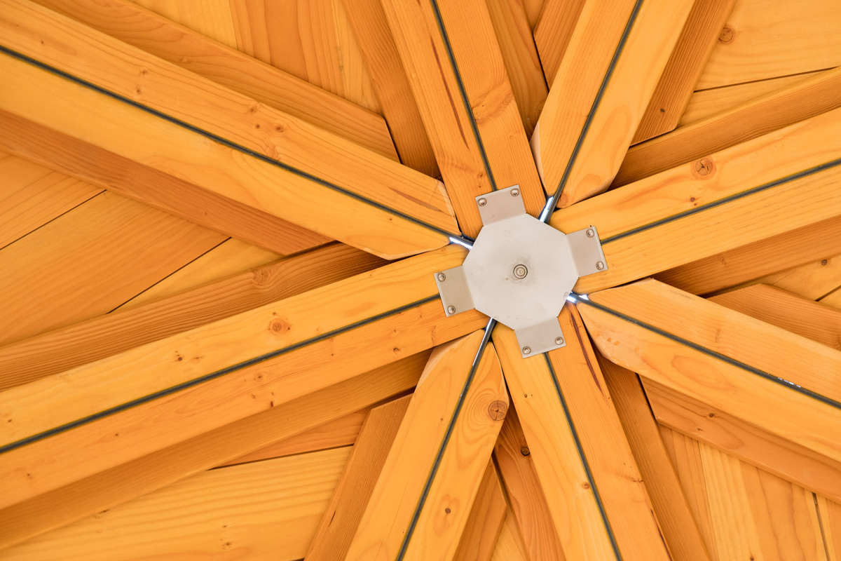 Larch wood - wooden ceiling made of larch wood photographed from below.